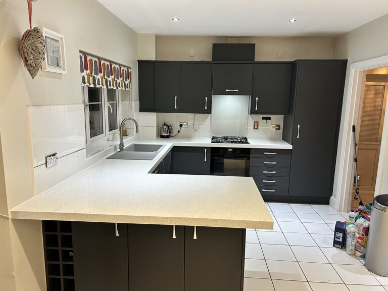 Jones doors in Matt Graphite – White Sparkle quartz overlay – West Sussex