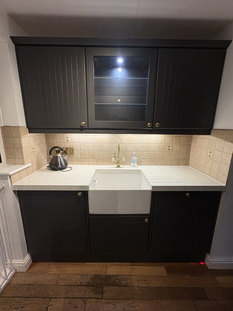 Shutter And Groove doors in Legno Graphite – Carrara Marble quartz overlay – Nottingham